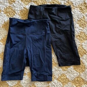 Set of 2 Athleta salutation stash bike shorts navy and black